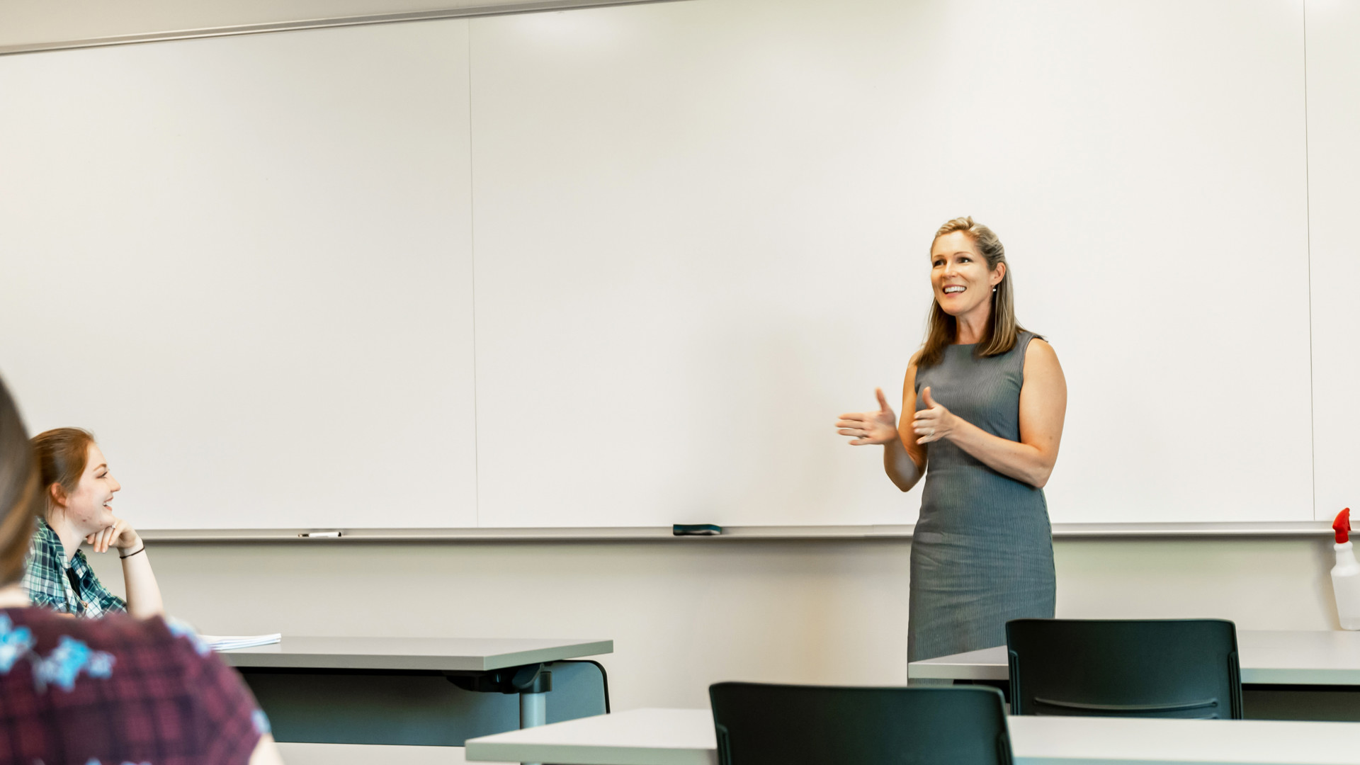 Female marketing professor teaching in classroom